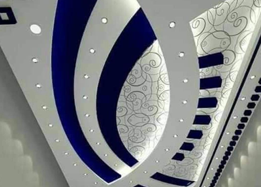 abstract false ceiling with blue accents by hescone engineering