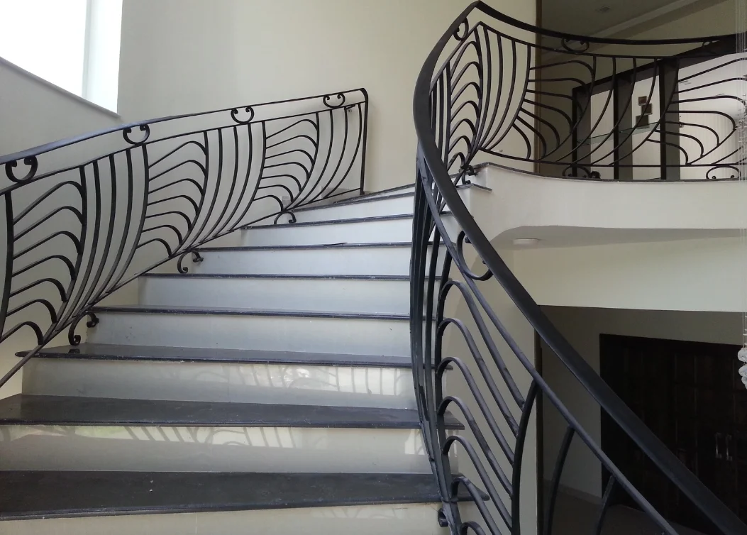 artistic wrought iron staircase railing by hescone engineering