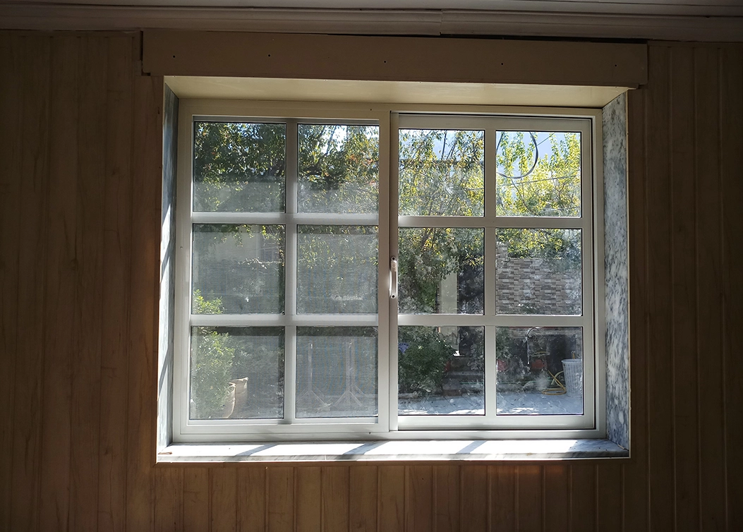white upvc sliding window by hescone engineering